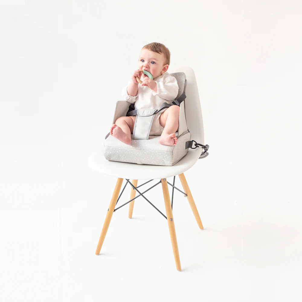 Bebé en silla Trona portable Galaxia gris